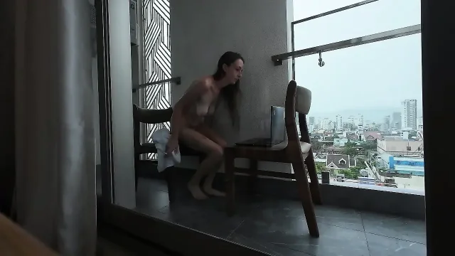 Horny Girl Strips And Plays With Pussy On Balcony