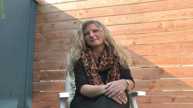 Busty Germans slut plays with a big orange dildo