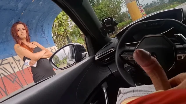 Risky handjob in the car for hottie at the bus stop in public