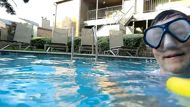 Couple Underwater Diving and Swimming
