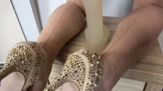 Riding on an enormous dildo