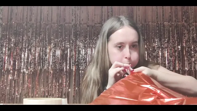 Getting Ready for Valentine's Day by Inflating Balloons