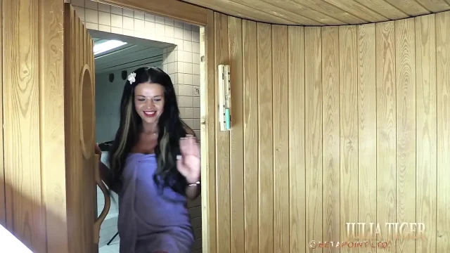 The model Julia at the threesome in the sauna