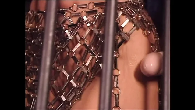 Two Beautiful Vintage Lesbian MILFs Fuck Each Other's Pussy with a Strapon in the Cage