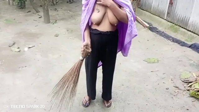 Girl Sweeping the Yard Naked in the Rain – Outdoor Scene