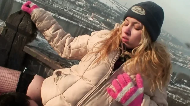 Blonde slut wearing fisnet stockings getting banged in snow outdoors