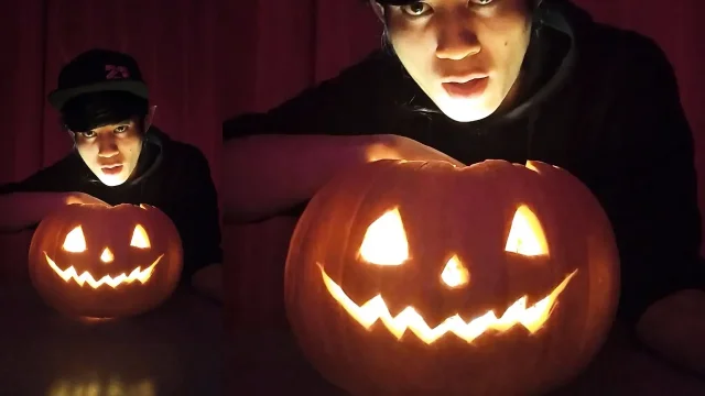 SFW Jon Arteen cute twink emo femboy carves a Halloween pumpkin in his underwear