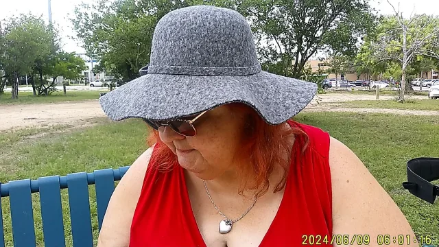 Nurse Vicki Smoking in the Park on a Bench All Dressed up